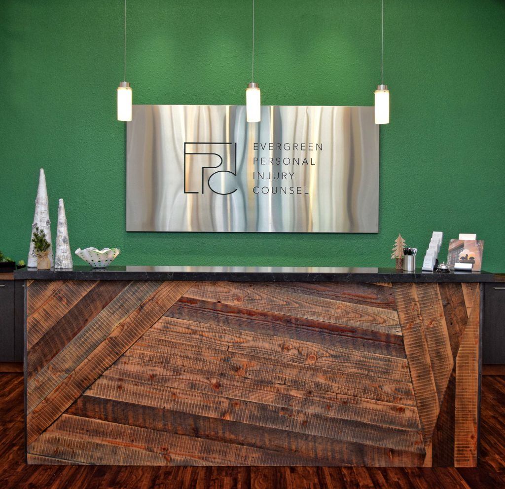 EPIC front desk by Urban Reclamation; aluminum dibond sign by Fife Signs